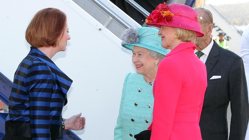 Julia Gillard greets The Queen in Canberra as Quentin Bryce looks on