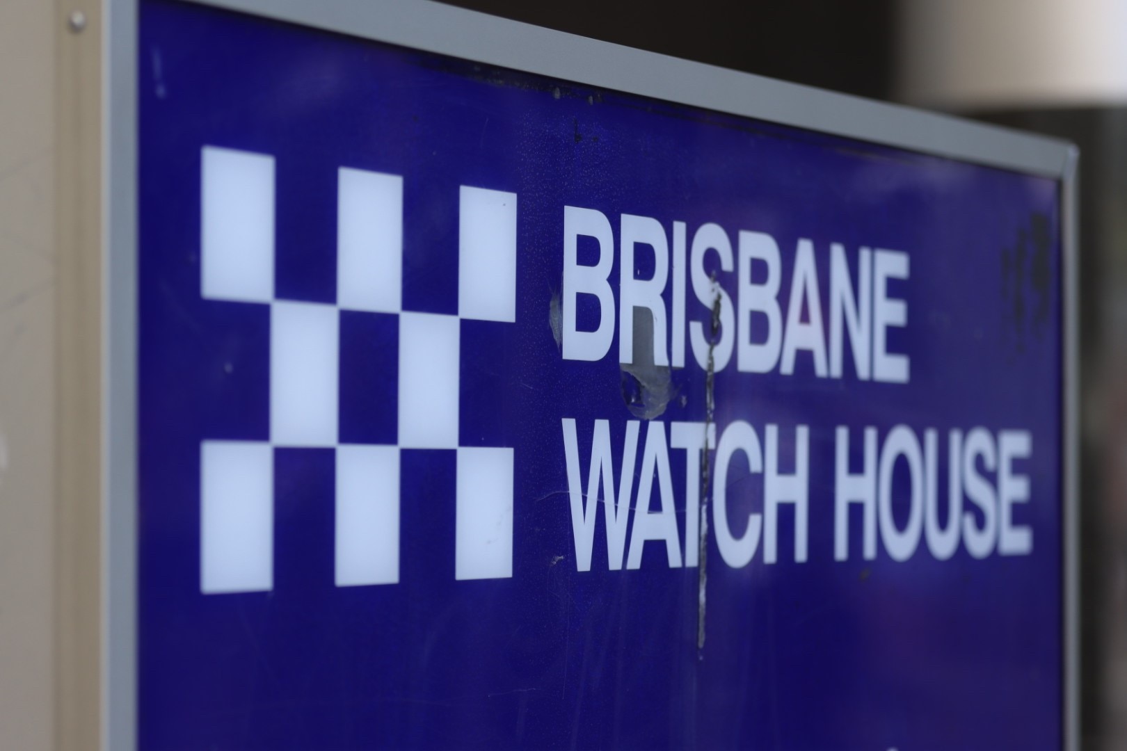 Blue and white Brisbane Watch House sign 