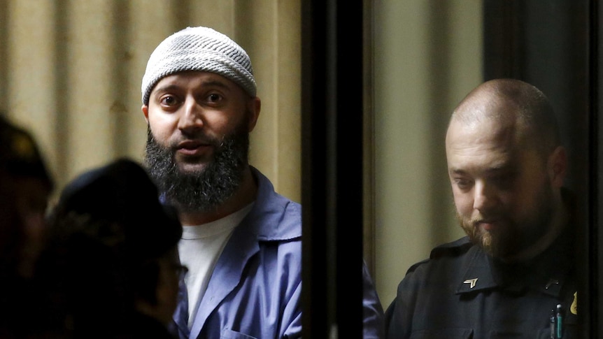 Convicted murderer Adnan Syed leaving a Baltimore courthouse