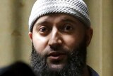 Convicted murderer Adnan Syed leaving a Baltimore courthouse