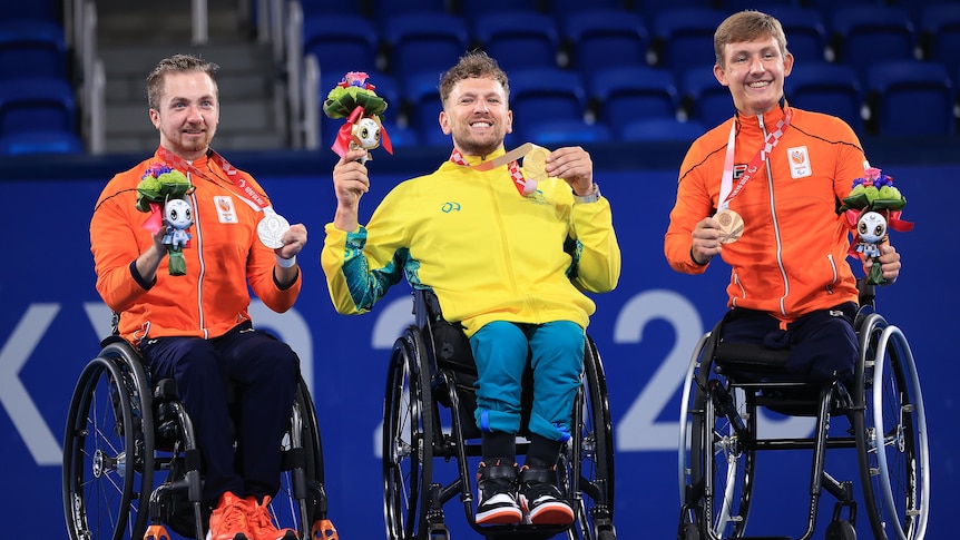 Tennis players receiving medal at the Paralympics