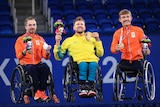 Tennis players receiving medal at the Paralympics