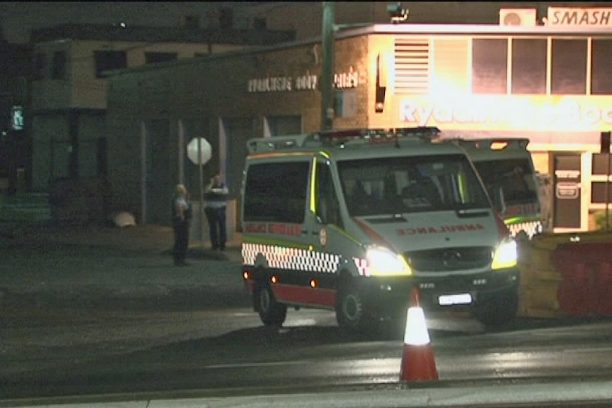 An ambulance outside a Sydney sex club where a man was shot 01 May 2013