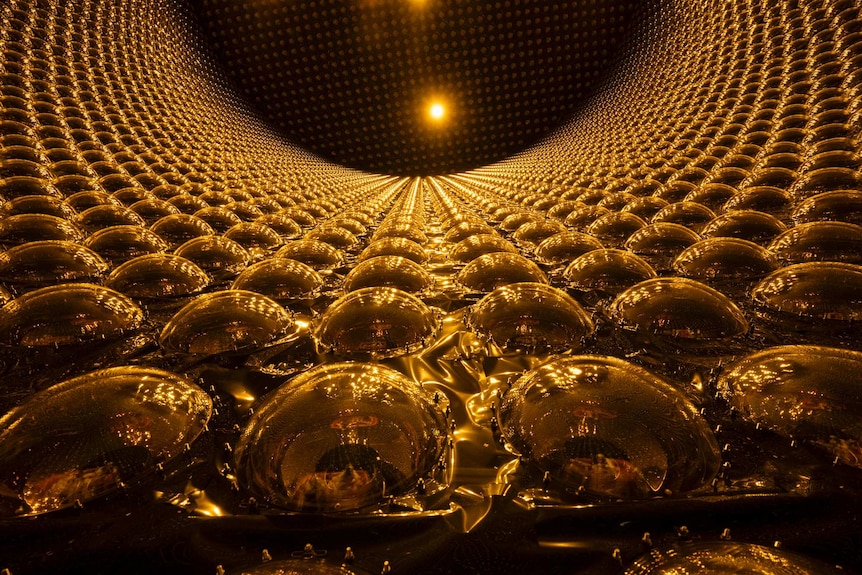 Circular wall of golden globes.