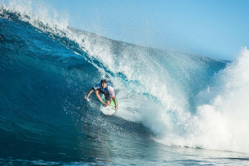 Gabriel Medina is seen surfing in a barrel.