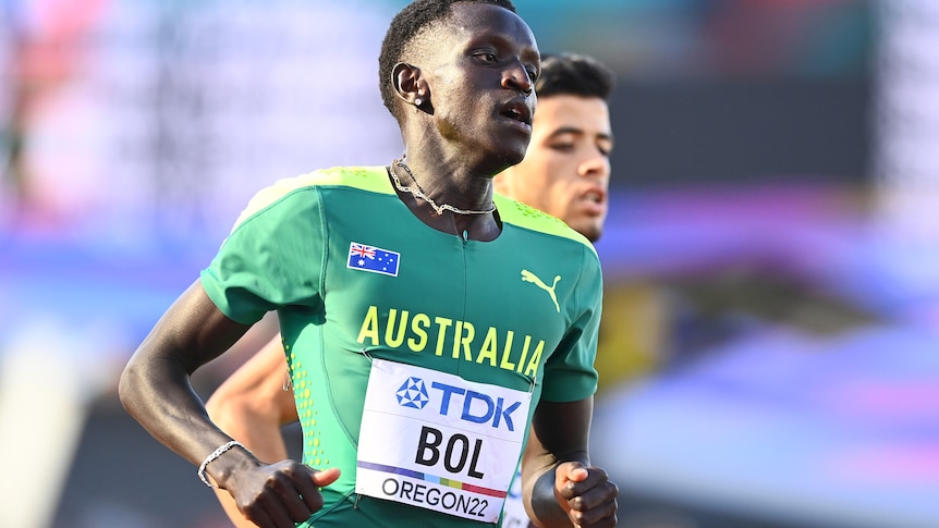 Peter Bol runs in his Australian colours