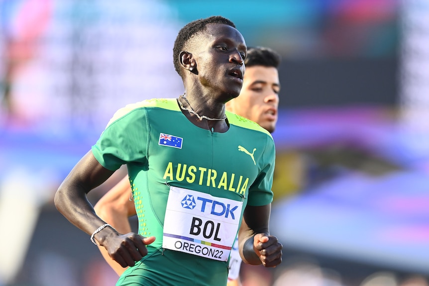 Peter Bol runs in his Australian colours