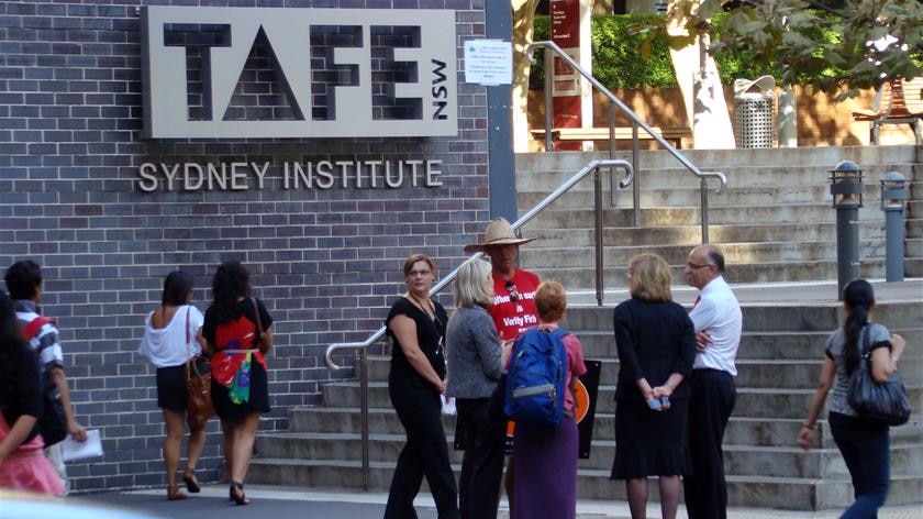 Teachers stand outside TAFE in Sydney
