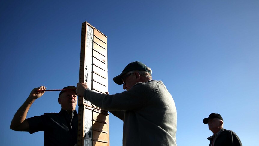 A bookmakers board is assembled at Flemington racecourse on Melbourne Cup day.