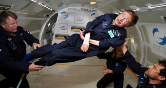 Stephen Hawking floats in a zero-gravity chamber.