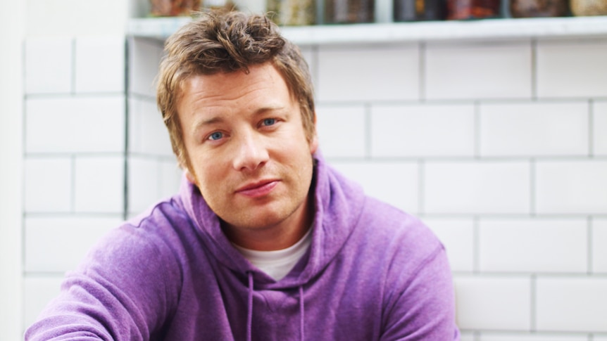 a portrait photograph of Jamie Oliver