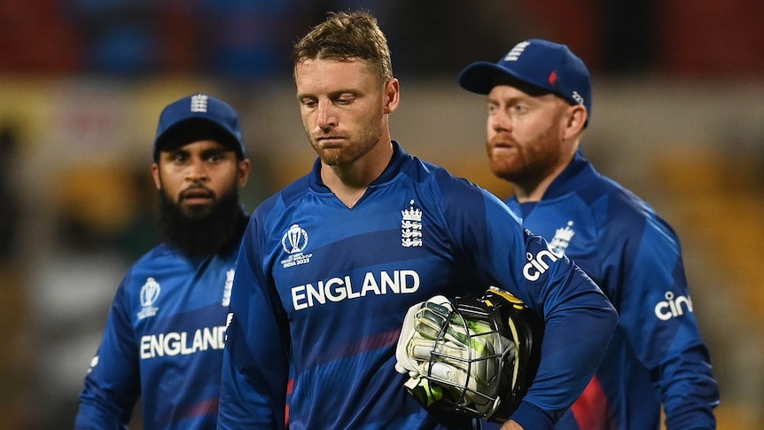Adil Rashid, Jos Buttler and Jonny Bairstow look disappointed