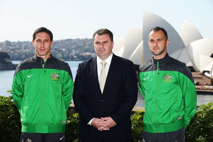 Ange Postecoglou, Mark Milligan and Ivan Franjic at the Socceroo's World Cup squad announcement