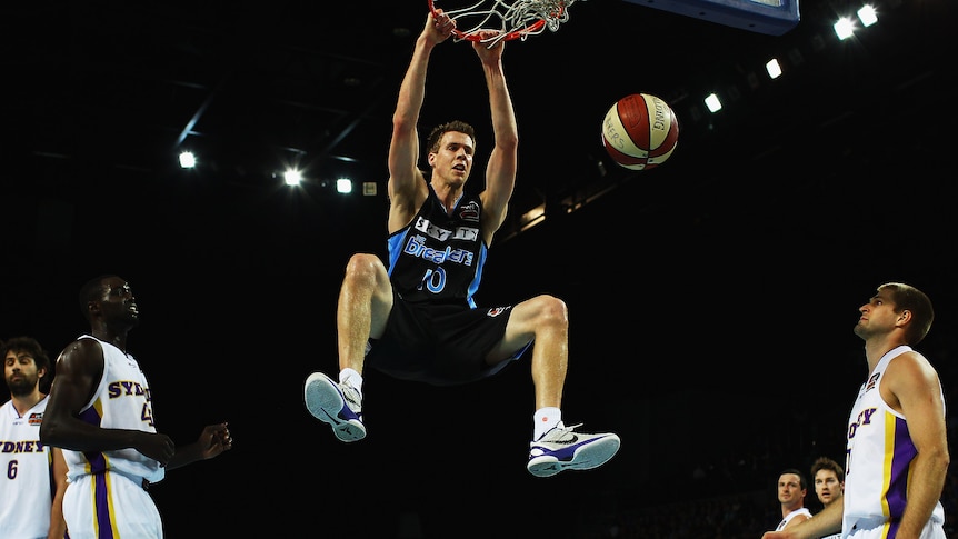 Throwing down ... Thomas Abercrombie makes a rare basket on an off night for the Breakers.