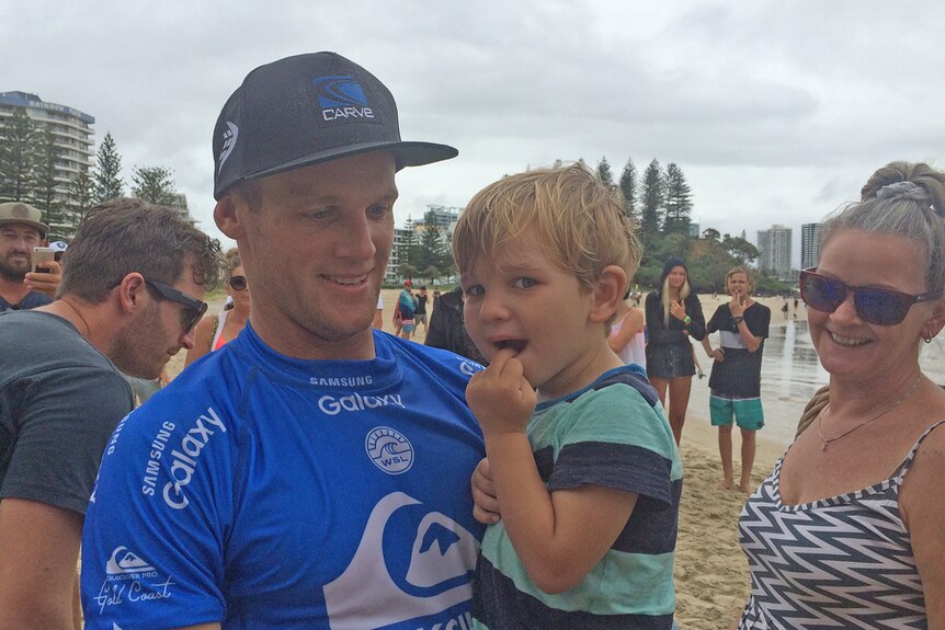 Surfer Stuart Kennedy with his family