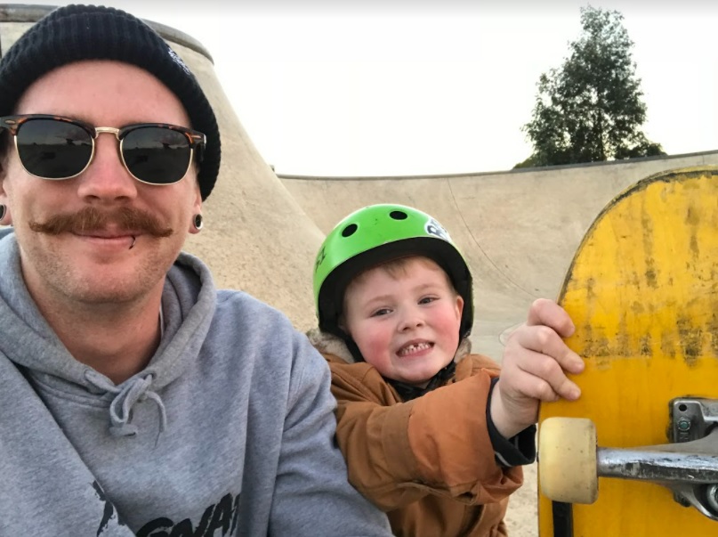 Jayden Sheridan with his young son Brooklyn at the skatepark posing for a selfie.