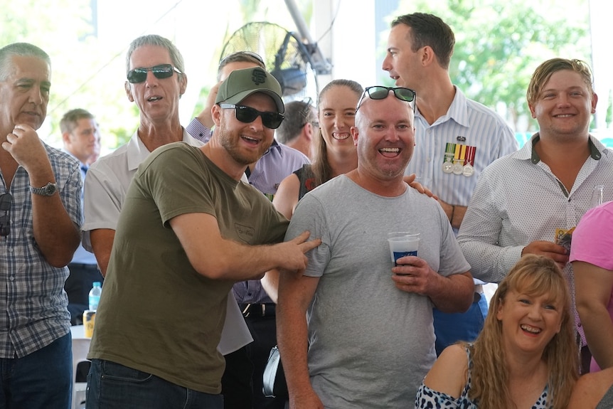 A group smiles for the camera