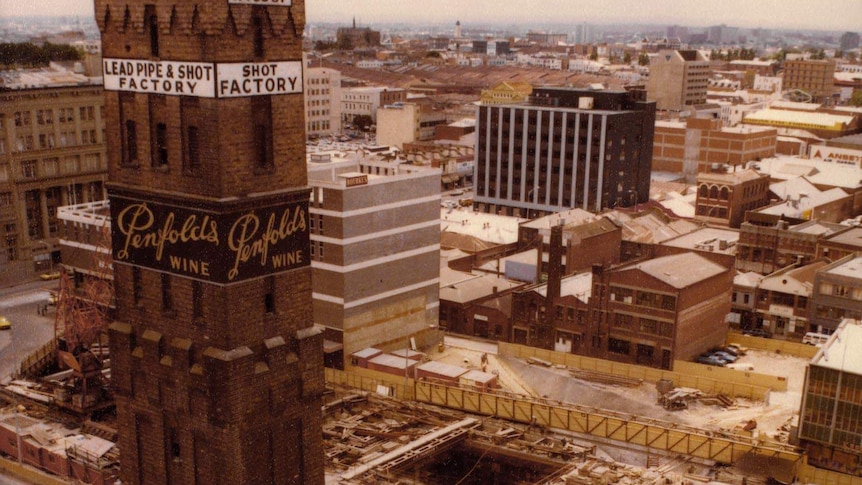 An aerial view of a shot tower looking over a construction site