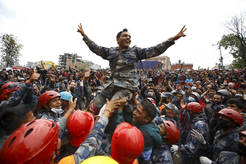 Rescuers cheer after successful rescue