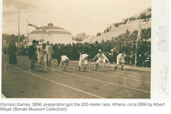 A black and white photo of men about to race at the Olympics in 1896
