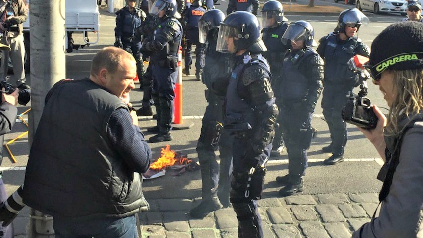 Australian flag set on fire by anti-racist protesters