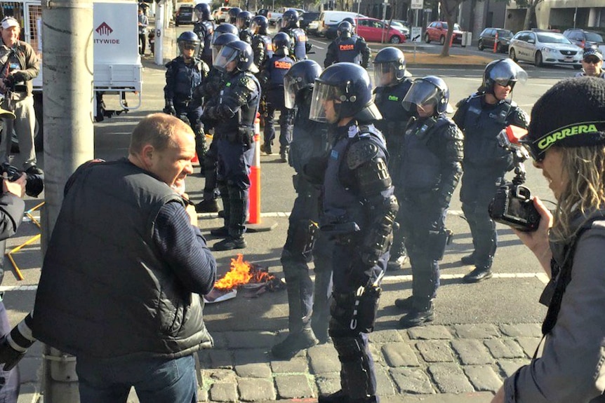 Australian flag set on fire by anti-racist protesters