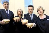LtoR Senators Bill Heffernan,Fiona Nash, Nick Xenophon and Christine Milne hold out meat pies