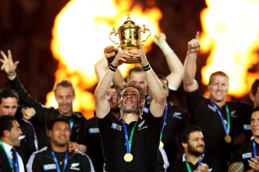 Richie McCaw lifts the Webb Ellis Cup after New Zealand beats France in 2011 Rugby World Cup final.