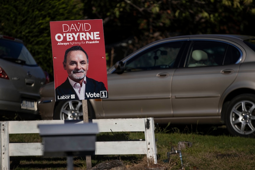 A red election sign for Franklin Labor candidate David O'Byrne