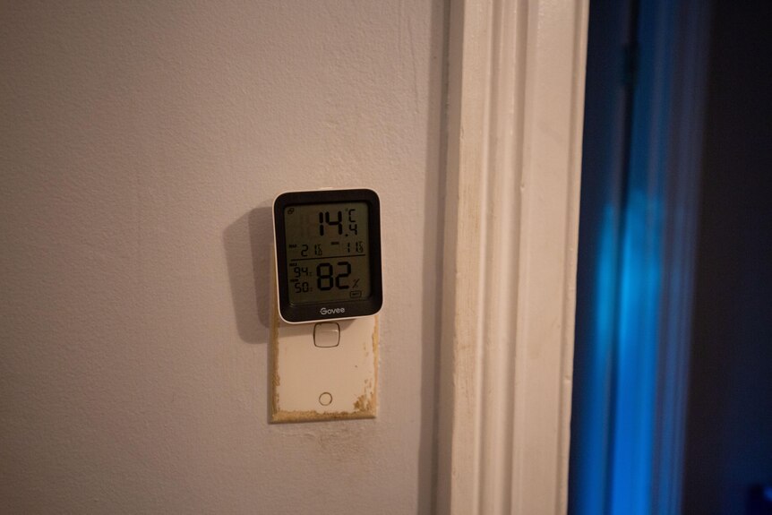 A little computer in the bedroom reads a temperature of 14 degrees.