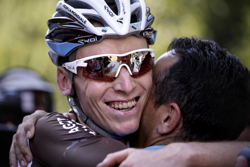 France's Romain Bardet celebrates with team-mate after winning stage 18 at Tour de France.