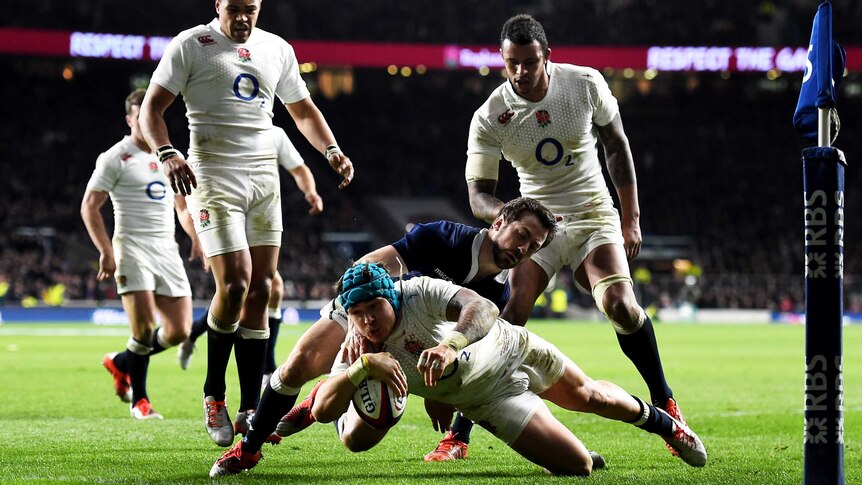 Jack Nowell dives over for a try for England against Scotland in the Six Nations