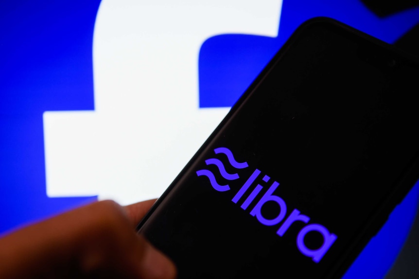 crypto currency logo, Libra seen displayed on a smartphone.