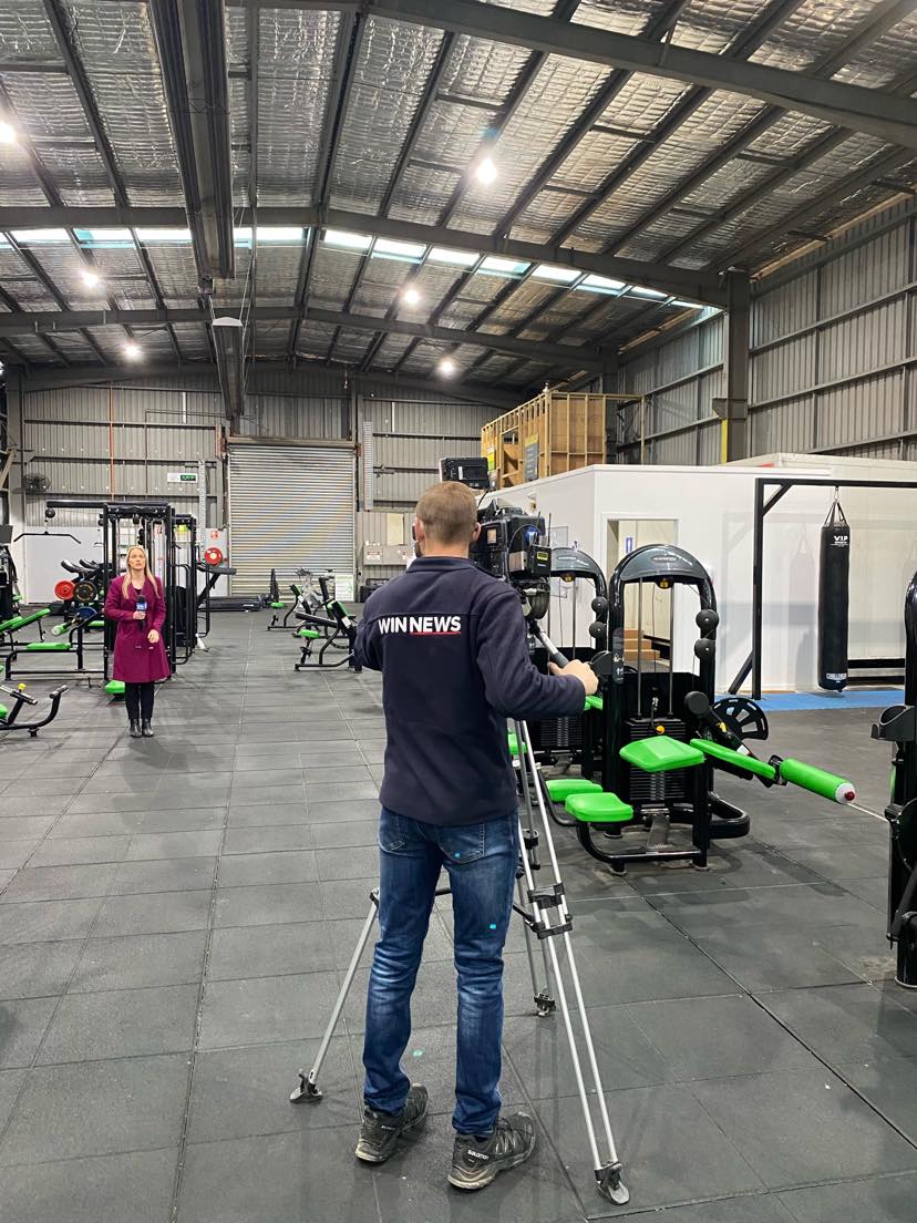 WIN Network journalist and camera operator