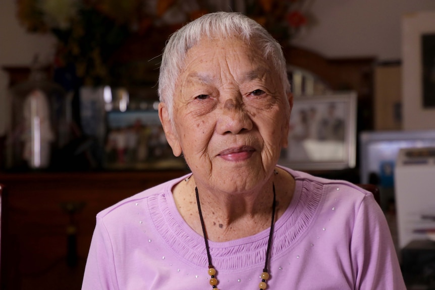 Headshot of an elderly Chinese woman.