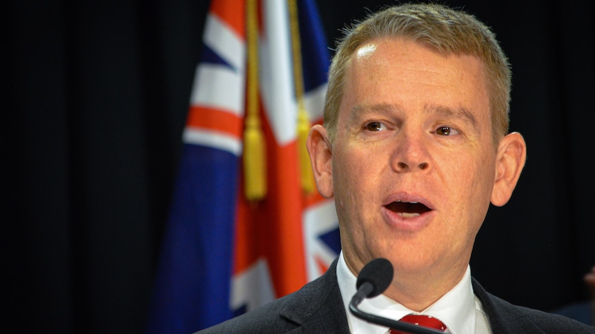 Chris Hipkins addressing a press conference. 