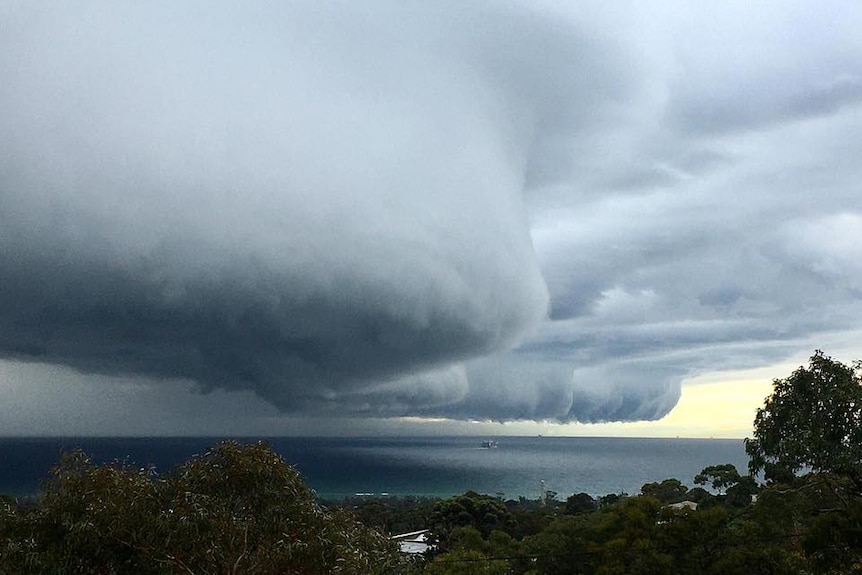 A large cold front with dramatic clouds over Port Phillip Bay