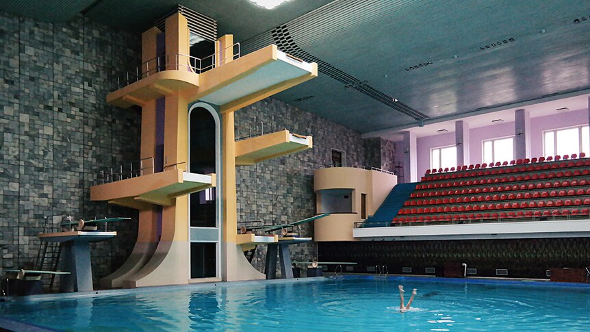 Colour photograph of the a diving pool stadium inside the Changgwang Health and Recreation Complex in Pyongyang