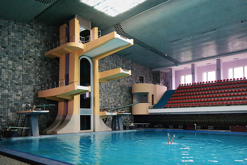 Colour photograph of the a diving pool stadium inside the Changgwang Health and Recreation Complex in Pyongyang