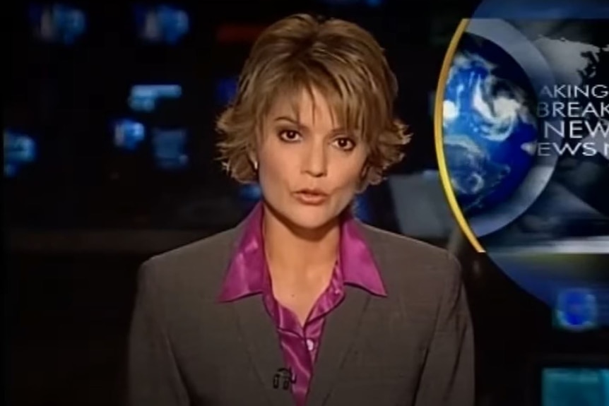 A female newsreader on TV.