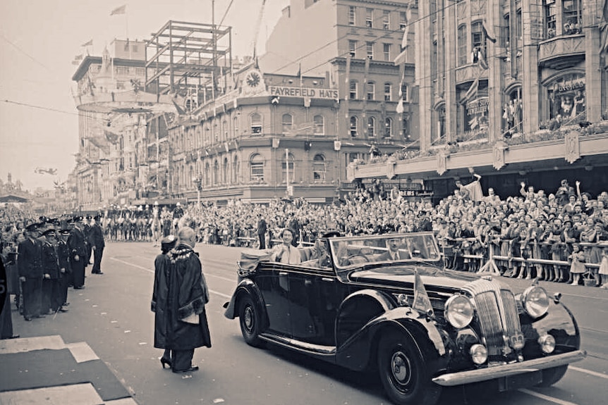 Huge crowds greet Queen Elizabeth II and Prince Philip as they arrive in Melbourne in 1954.