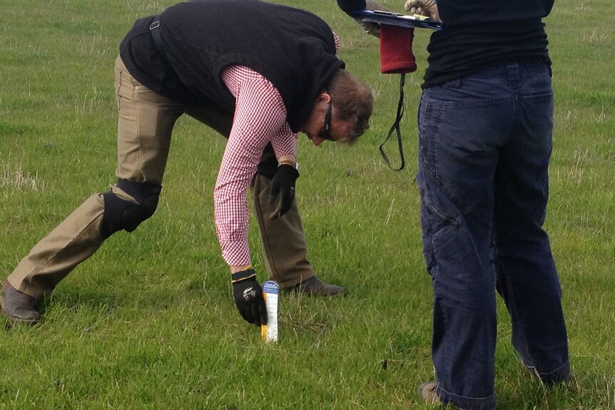 Tony Butler testing soil with the optical sensor.
