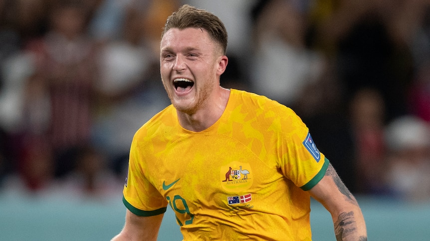 Harry Souttar celebrates after Australia play Denmark with a double first pump