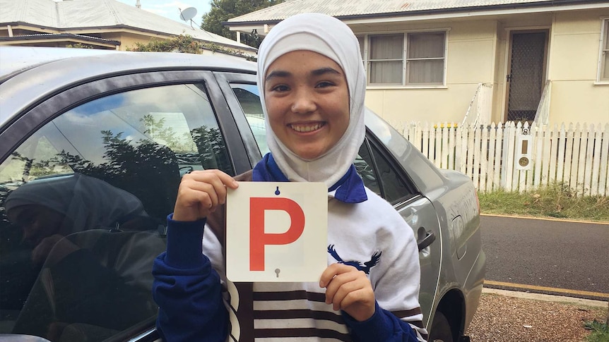 Rahila Abdul Hadi holding her P-plates