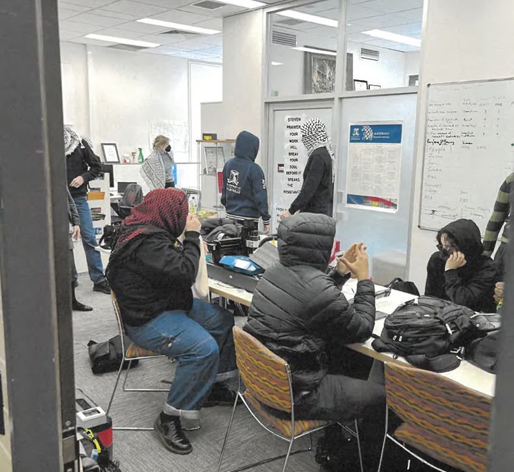 Professor hired private investigator after protest, commission hears