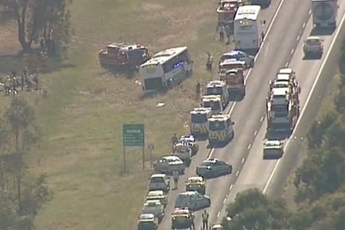 Emergency services attend after a school bus was hit by a truck in Victoria's north east.