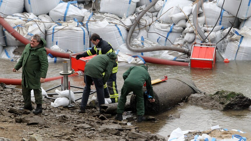 An undetonated bomb sits in the River Rhine