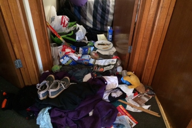 Belongings strewn around the hallway of a Burnie house, Tasmania.