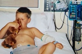 4 year old Denim Bucknell in a Brisbane hospital sick with Q fever and surrounded by medical equipment