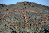 A peace sign on the floor.